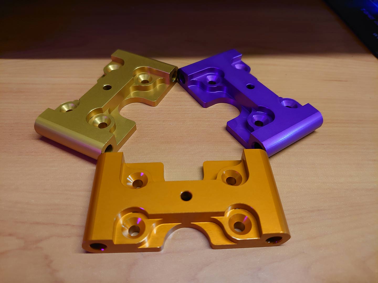 Showcasing our three colours of anodised buggy parts, a small portion of our collection.